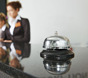Bell on hotel front desk - Keep pests away from your commercial property with Bug Out in St. Louis
