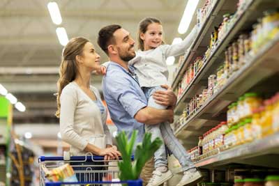 Man woman and child in grocery store aisle - Keep pests away from your commercial property with Bug Out in St. Louis