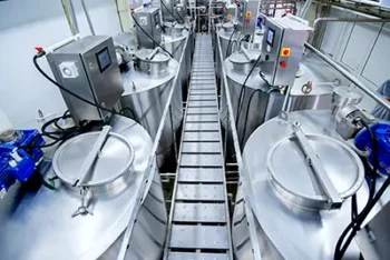 Overview of large vats in a food processing plant